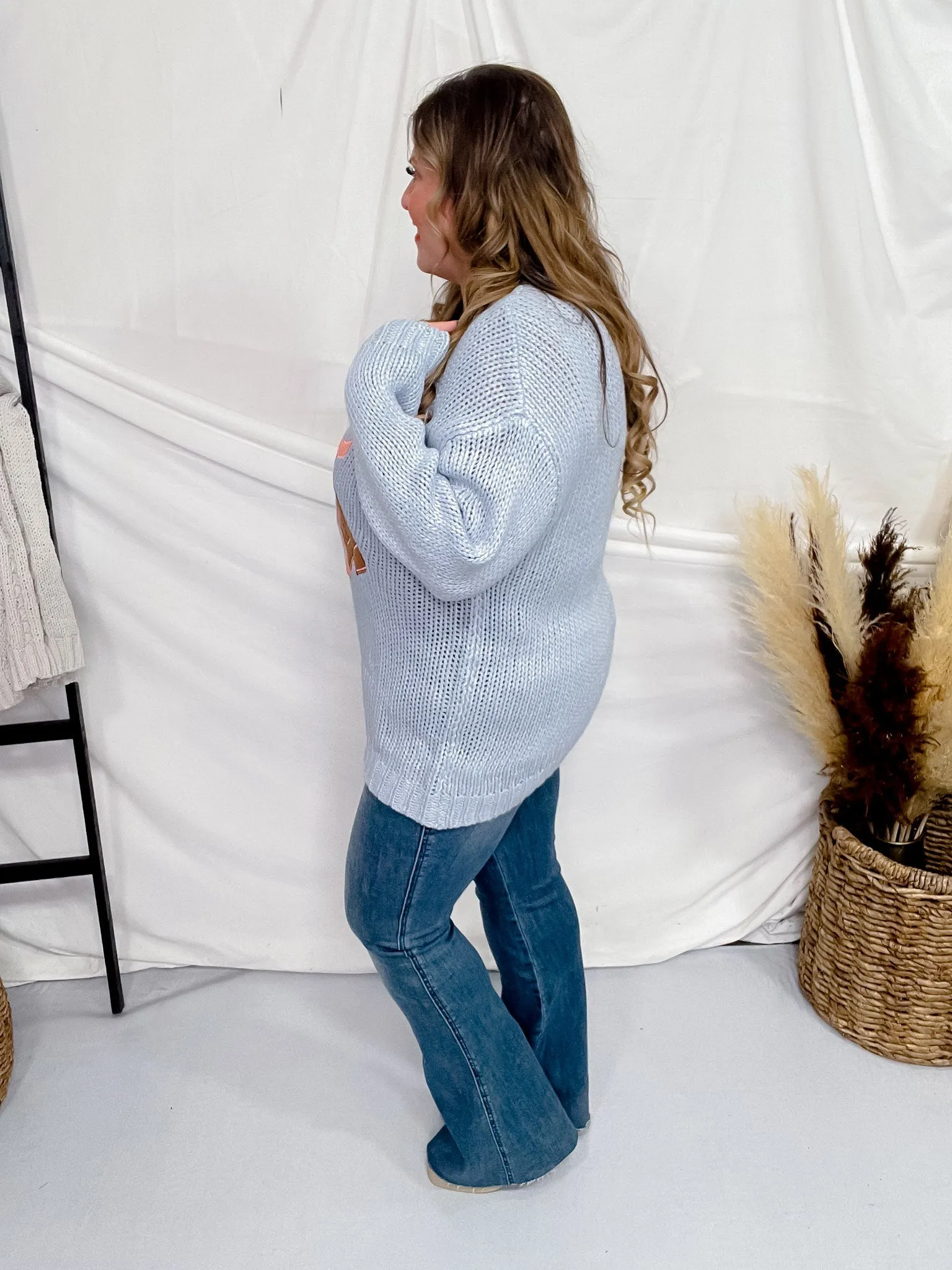 Cowboy Boots With Ribbon Knit Sweater