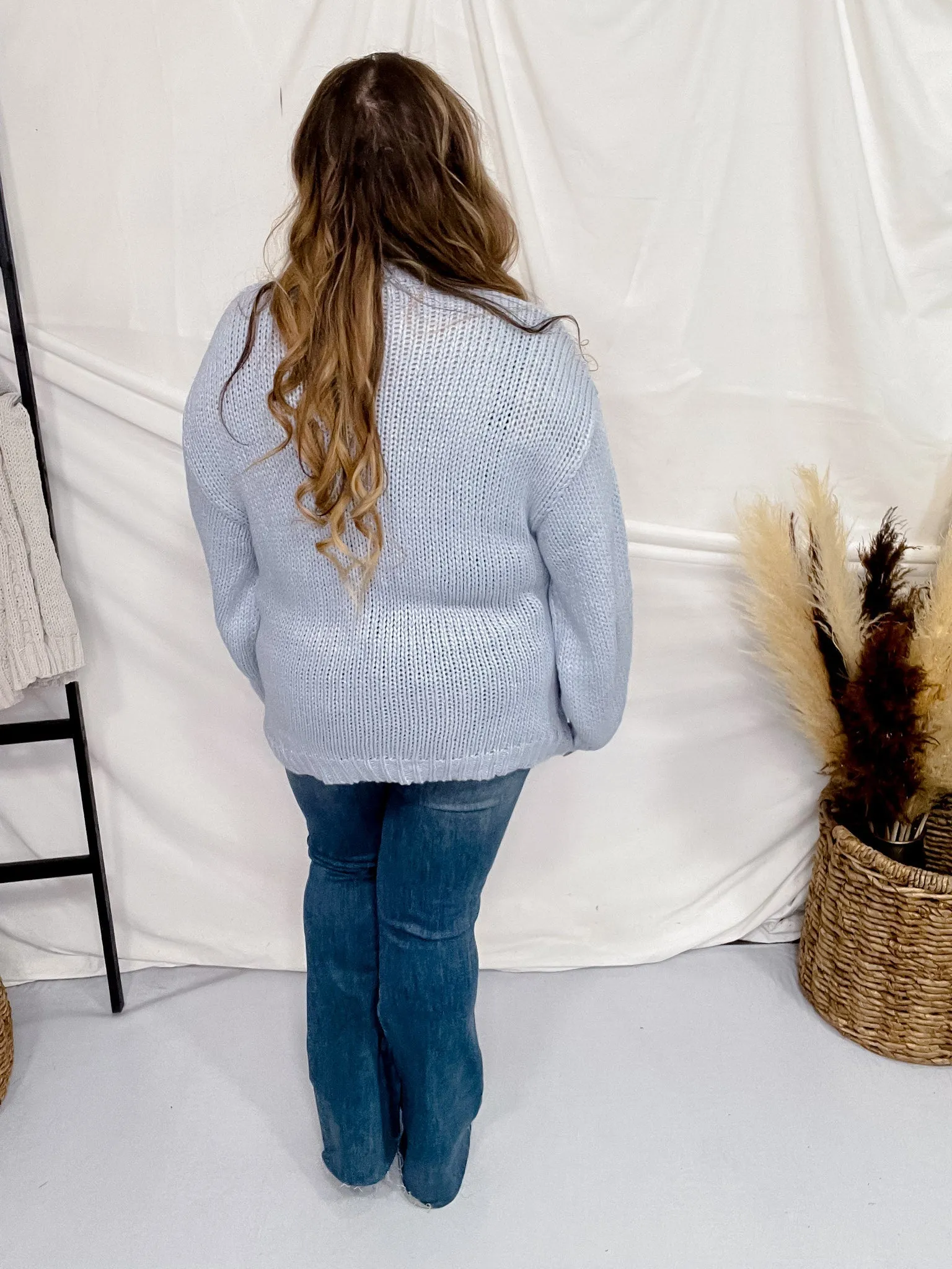Cowboy Boots With Ribbon Knit Sweater